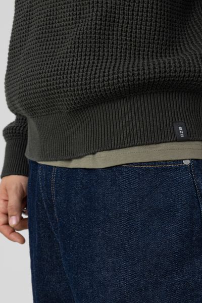 Pull col rond matière fantaisie