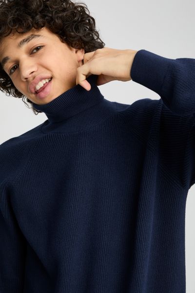 Pull col roulé