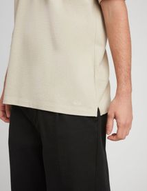 Polo matière fantaisie