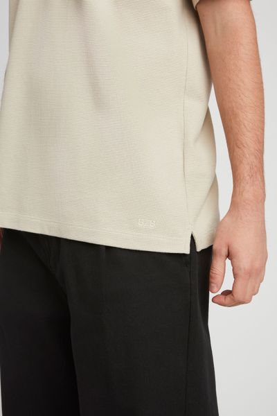Polo matière fantaisie