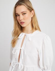 Chemise rayée à nœuds