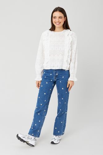 Jean straight brod&eacute; fleurs