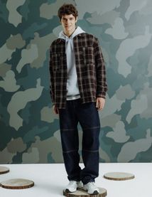 Jean loose &agrave; d&eacute;coupes