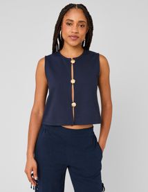 Top avec d&eacute;tails de boutons dor&eacute;s