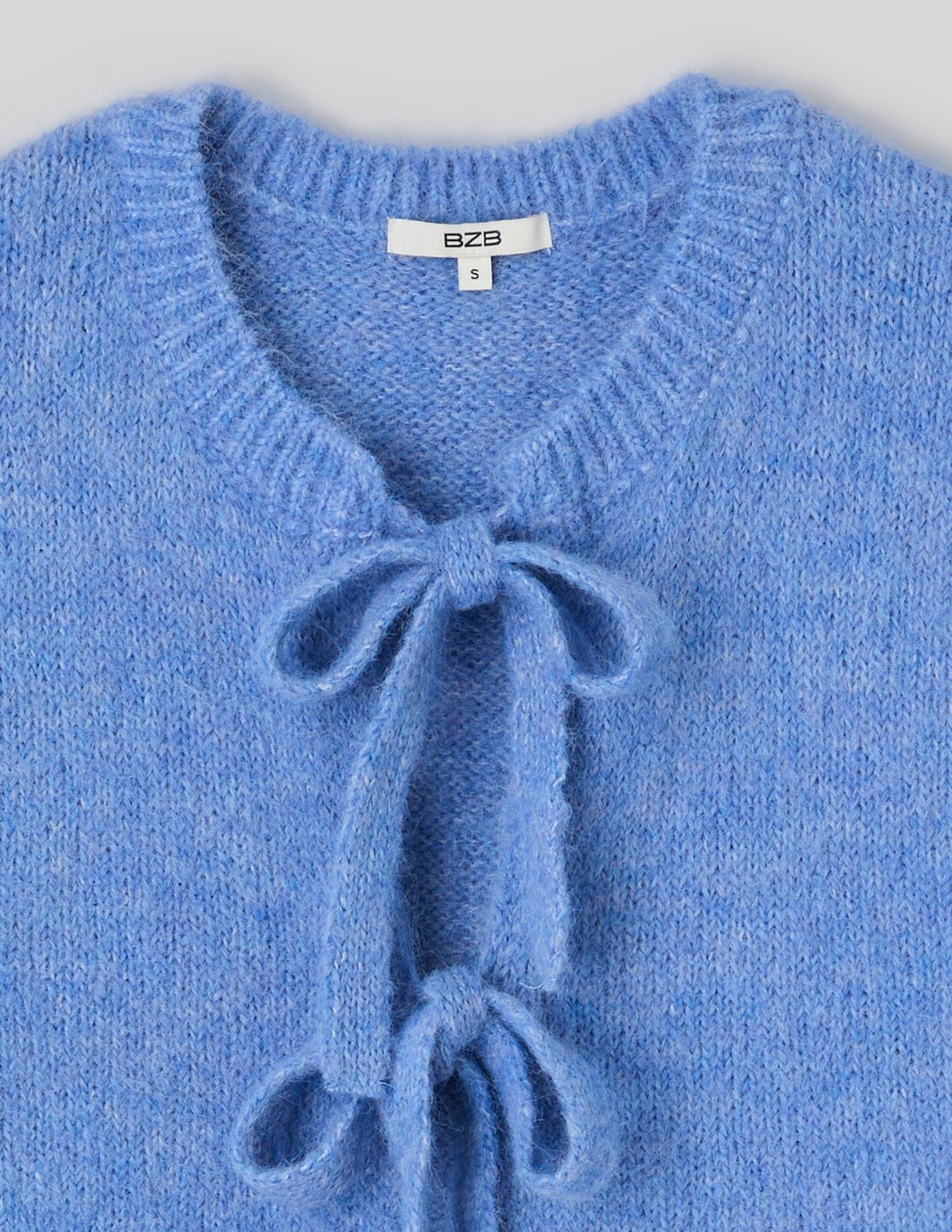 Gilet sans manches &agrave; nouer