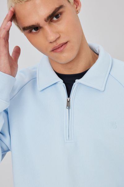 Sweat col polo zippé