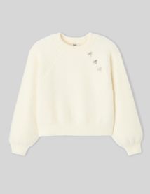 Pull fluffy boutons bijoux