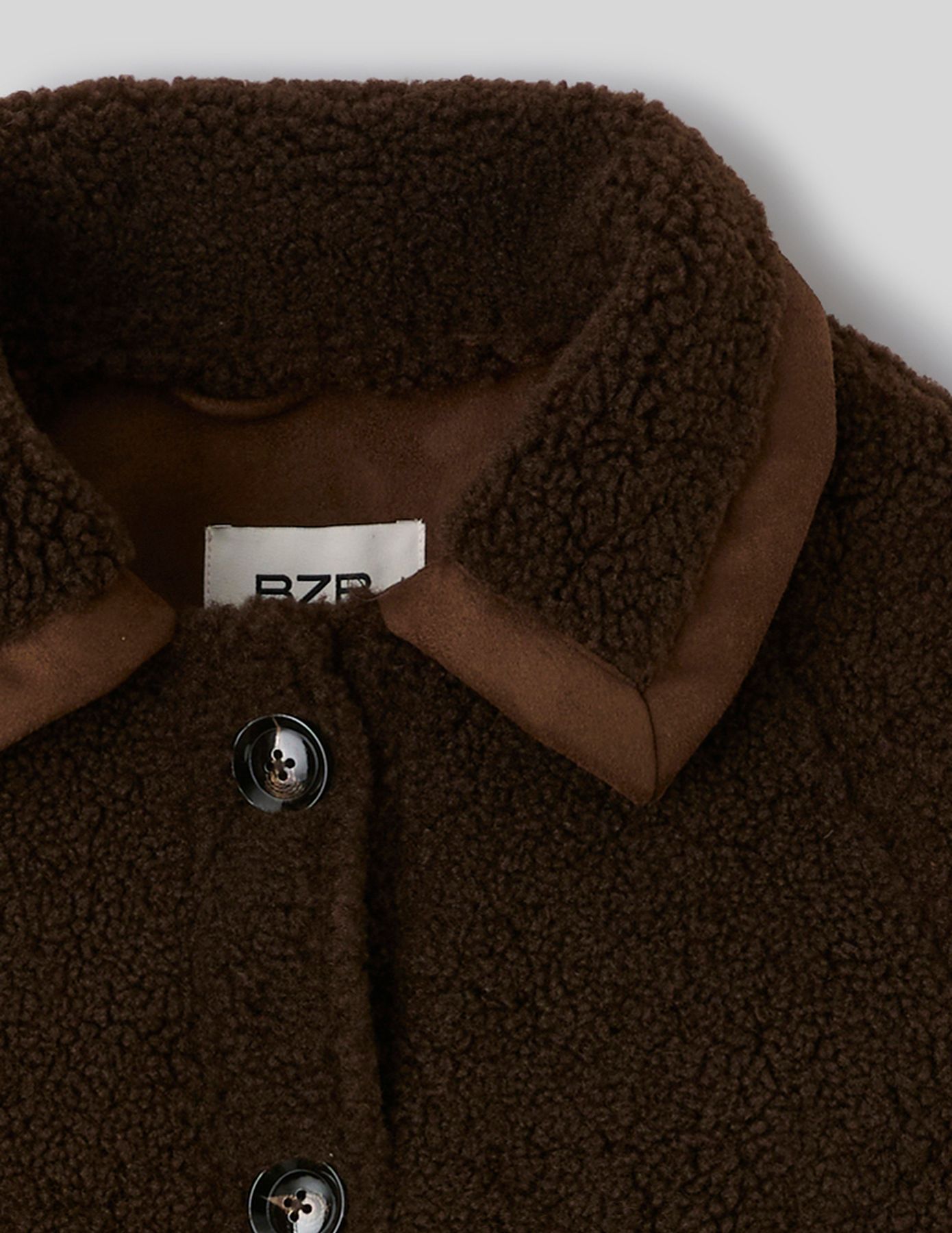 Veste en sherpa d&eacute;tails su&eacute;dine