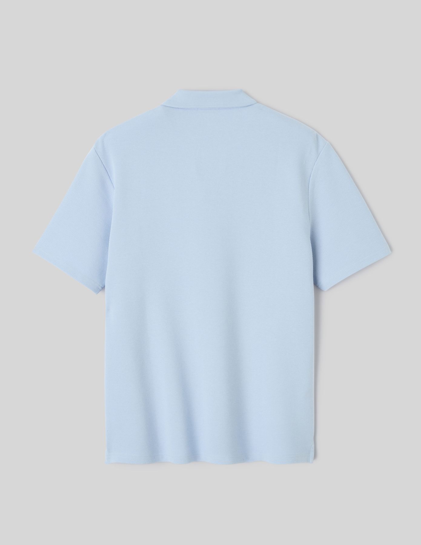 Polo mati&egrave;re gaufr&eacute;e