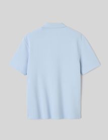 Polo mati&egrave;re gaufr&eacute;e