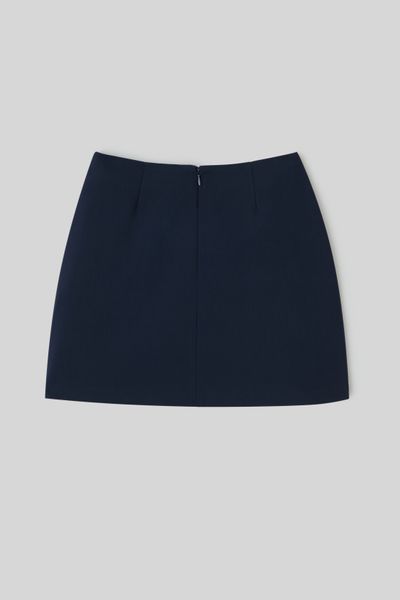 Jupe courte avec boutons dorés