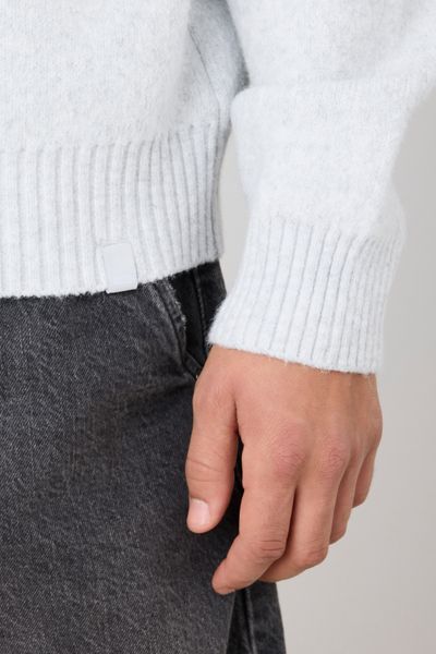 Pull col polo zippé
