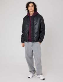 Blouson zippé en tissu enduit