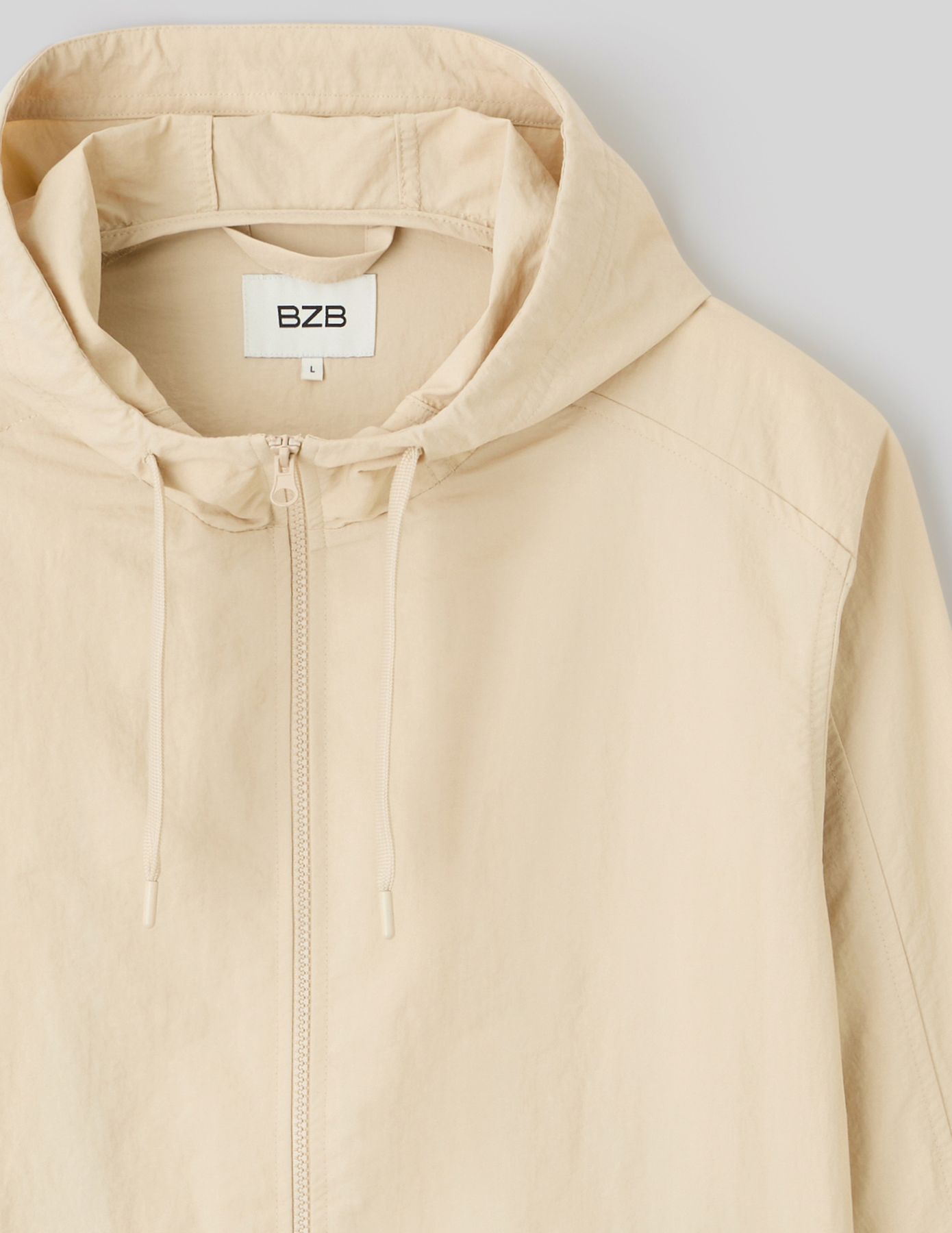 Blouson coup vent à capuche