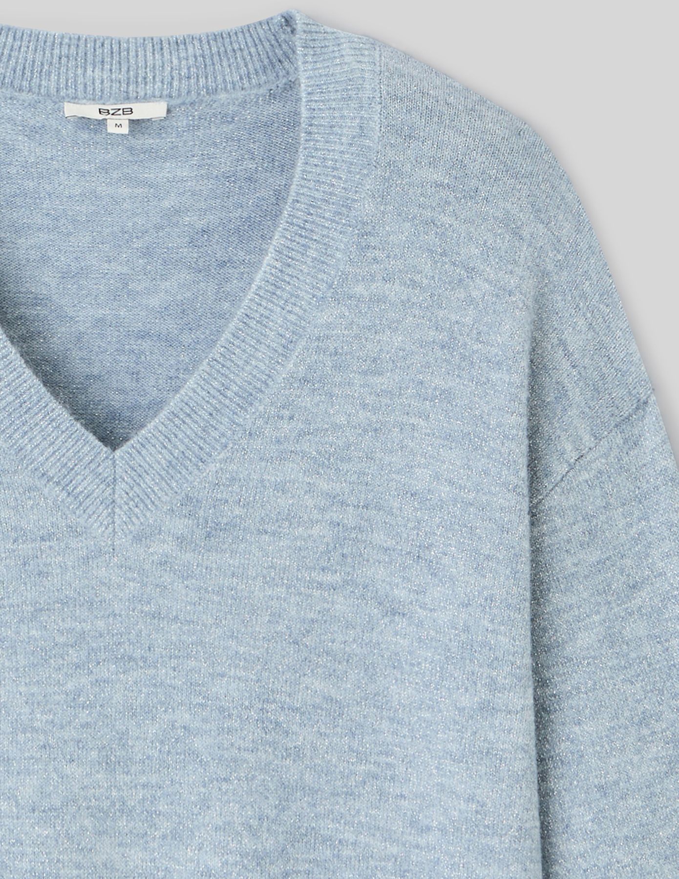 Pull col V pailleté