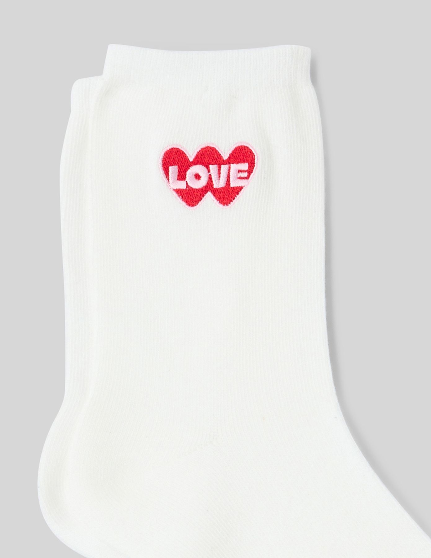 Chaussette unitaire brod&eacute;e