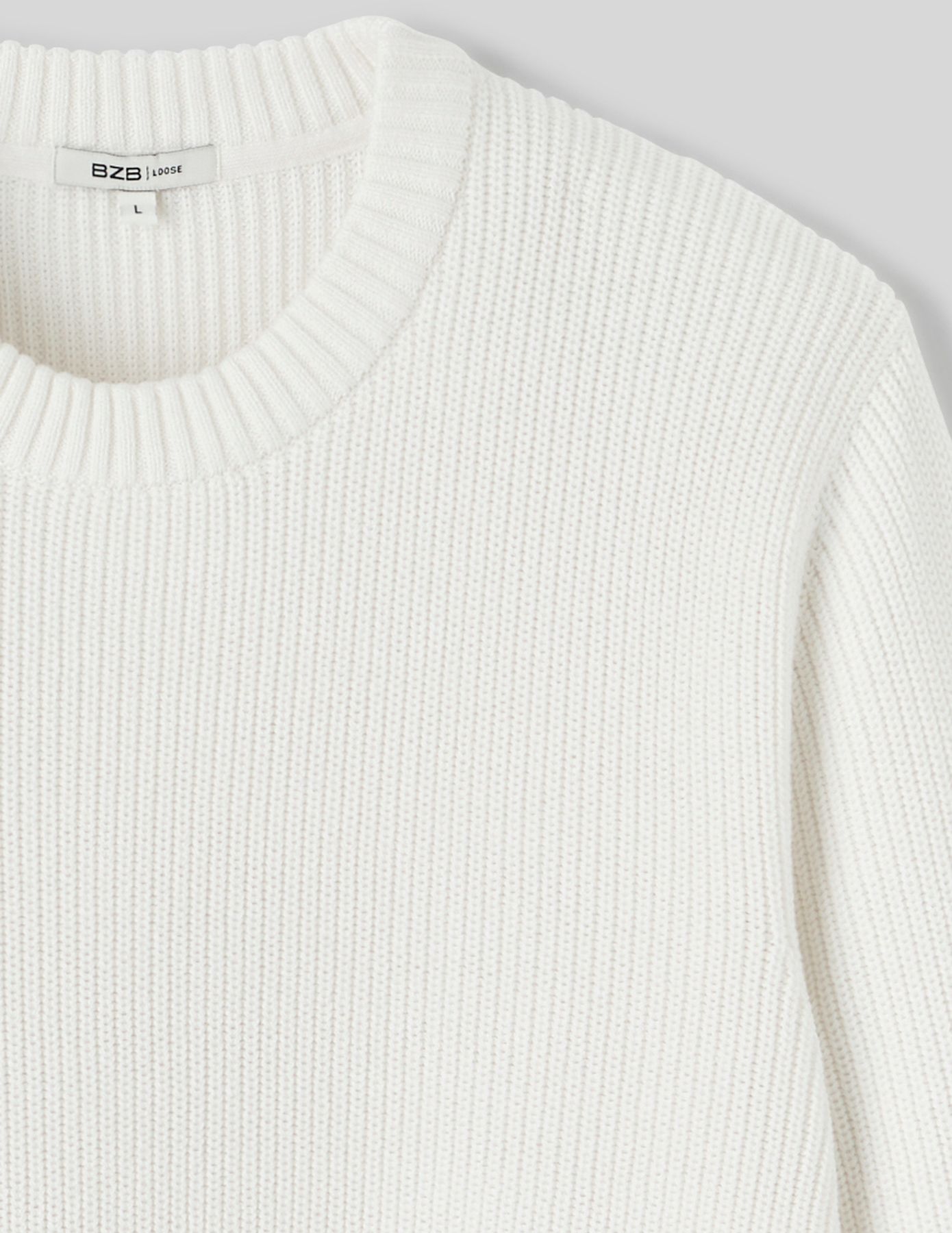 Pull col rond matière fantaisie
