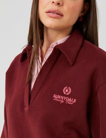 Sweat col polo broderie poitrine