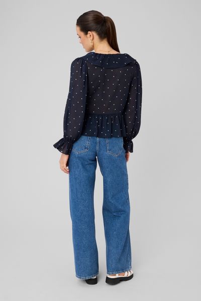 Blouse &agrave; volants motif pois