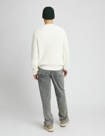 Pull col rond matière fantaisie