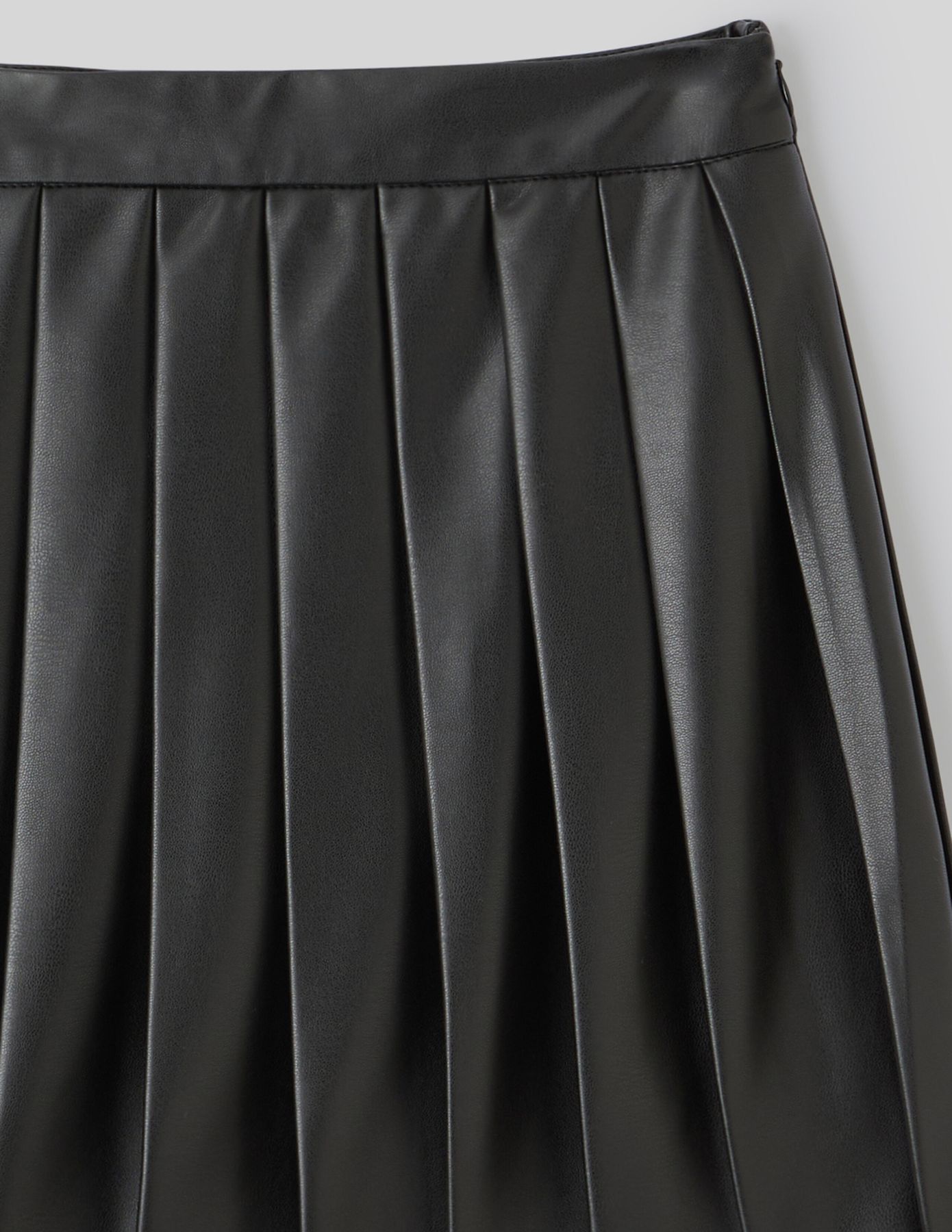 Jupe pliss&eacute;e en tissu enduit