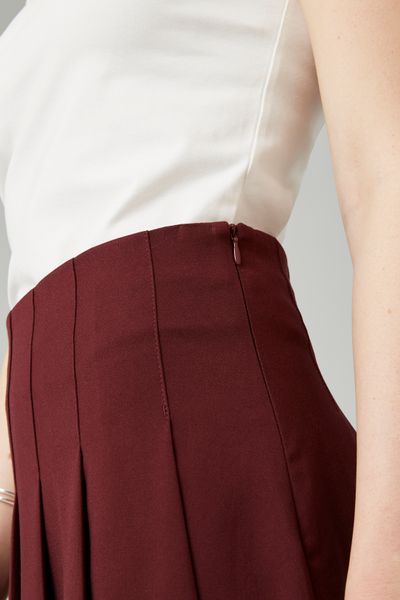 Jupe courte plissée en polyester recyclé