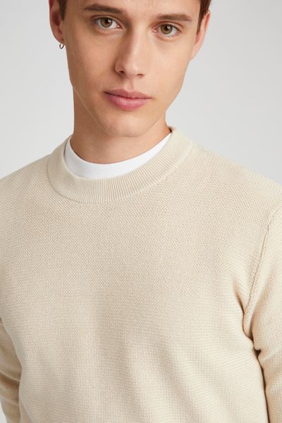 Pull matière fantaisie