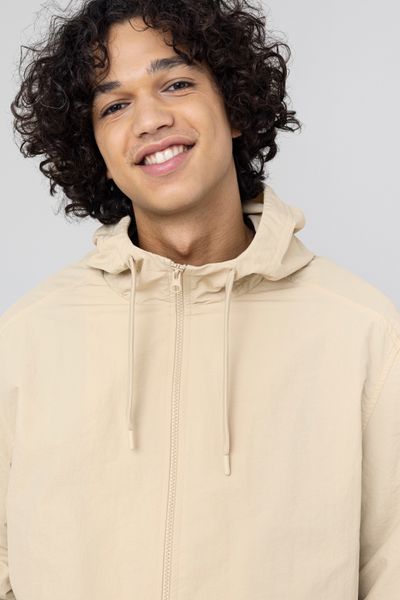 Blouson coup vent à capuche