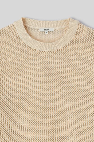 Pull en crochet avec fil pailleté