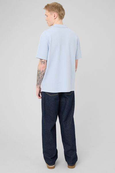 Polo mati&egrave;re gaufr&eacute;e