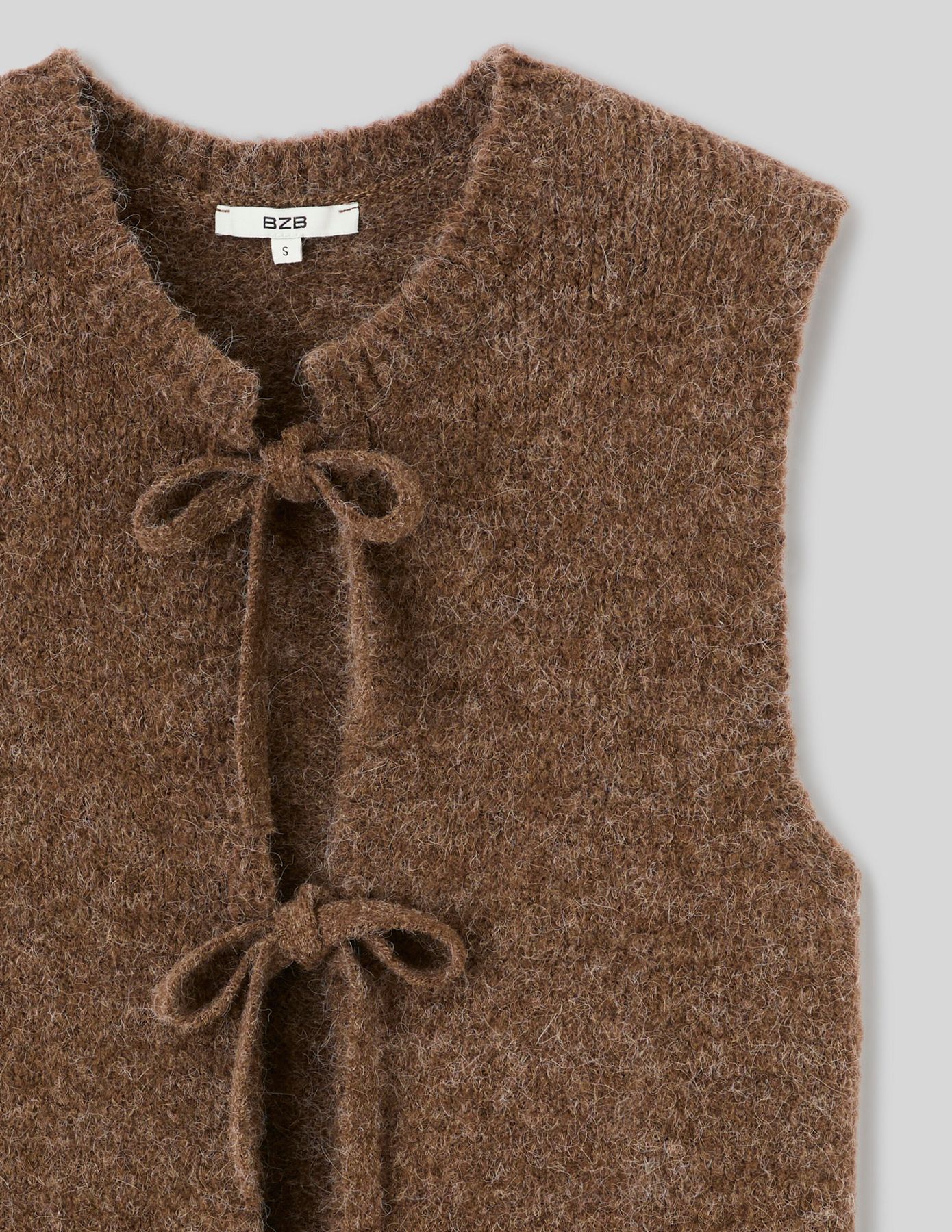 Gilet sans manche &agrave; n&oelig;uds