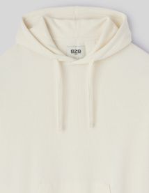 Sweat à capuche matière fantaisie