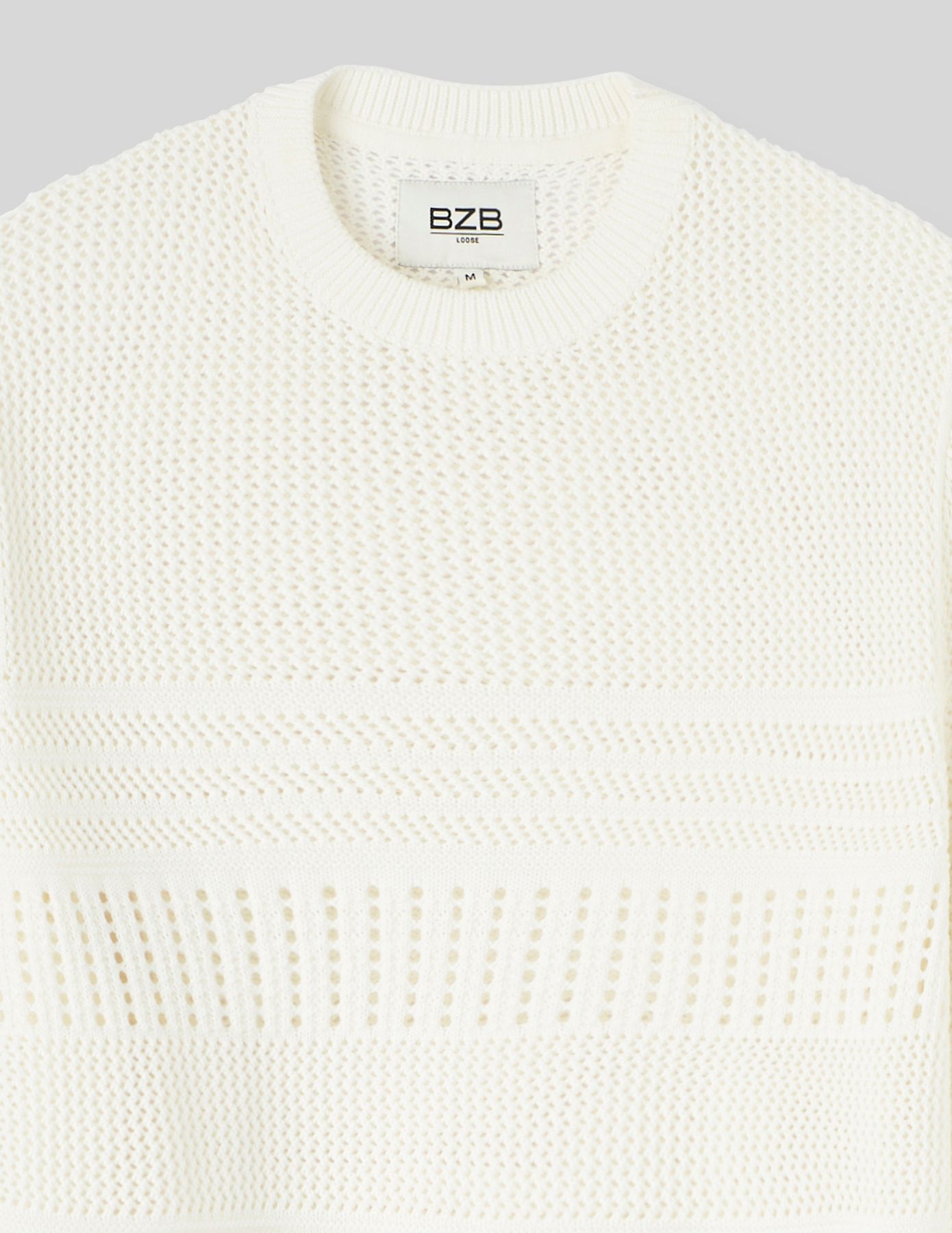 Pull col rond ajouré