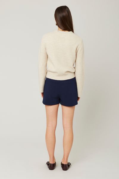 Jupe short boutons dor&eacute;s