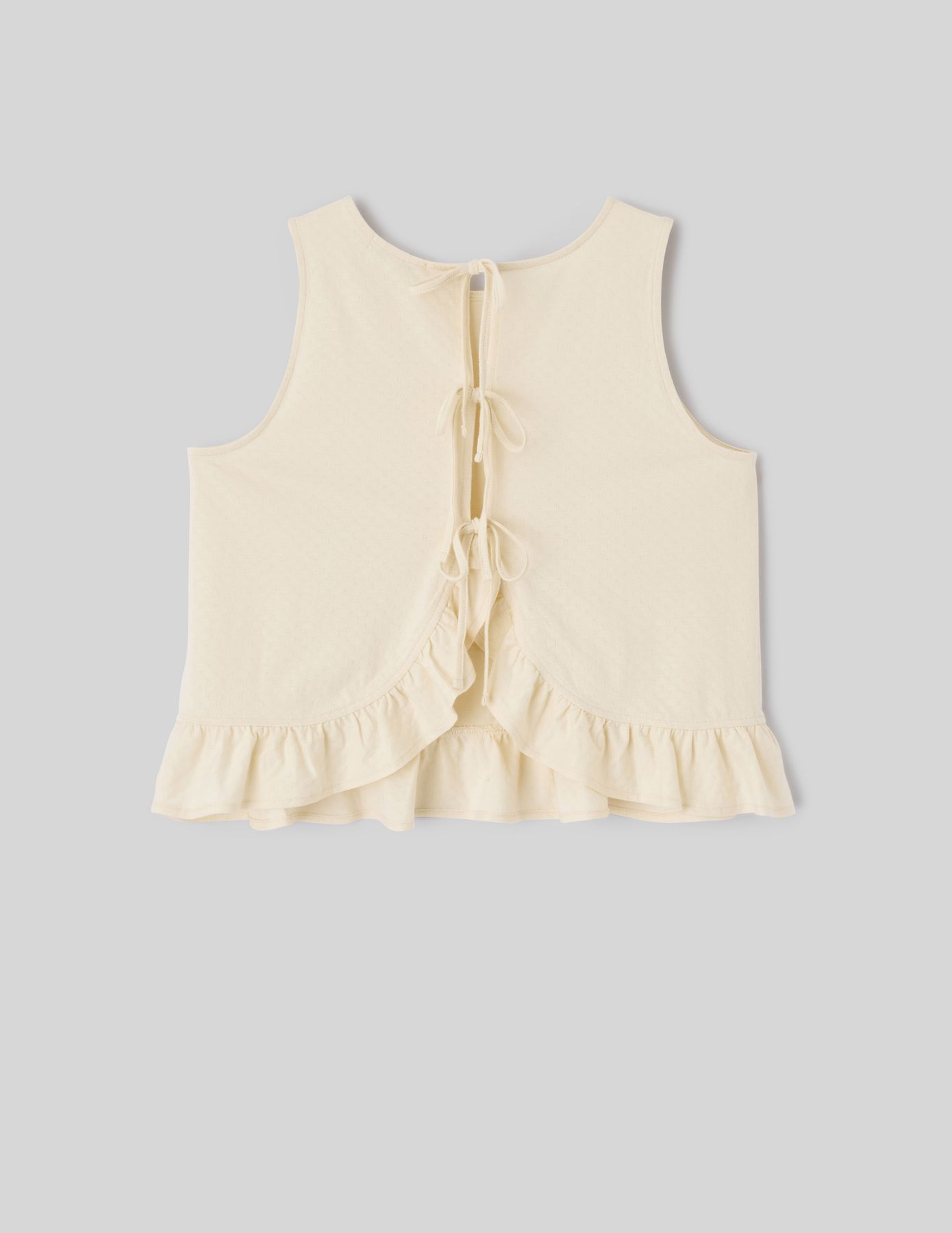 Top avec n&oelig;uds au dos