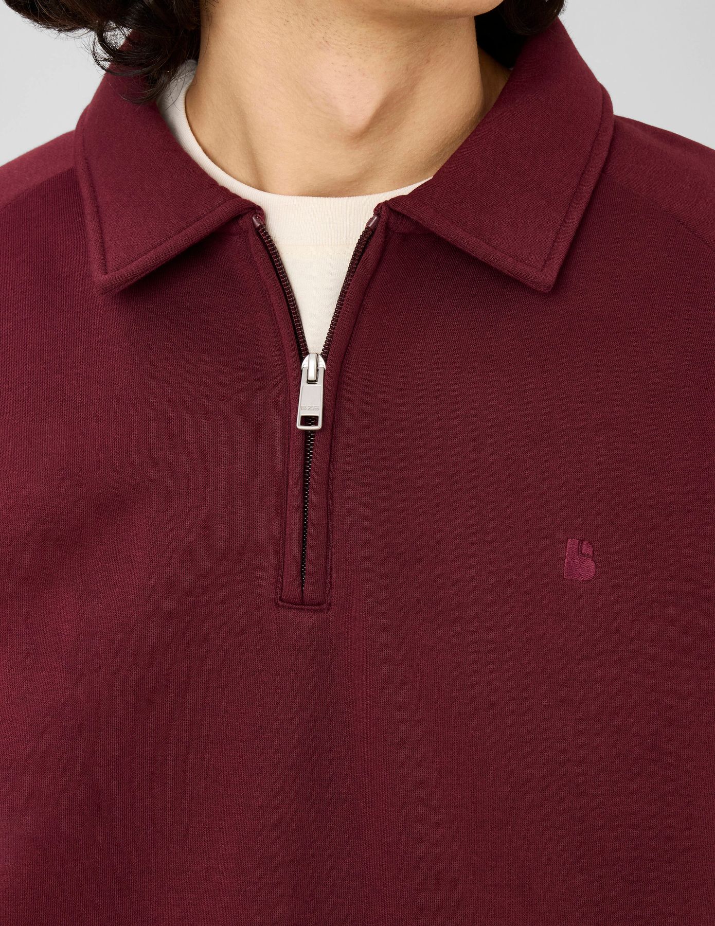 Sweat col polo zipp&eacute;
