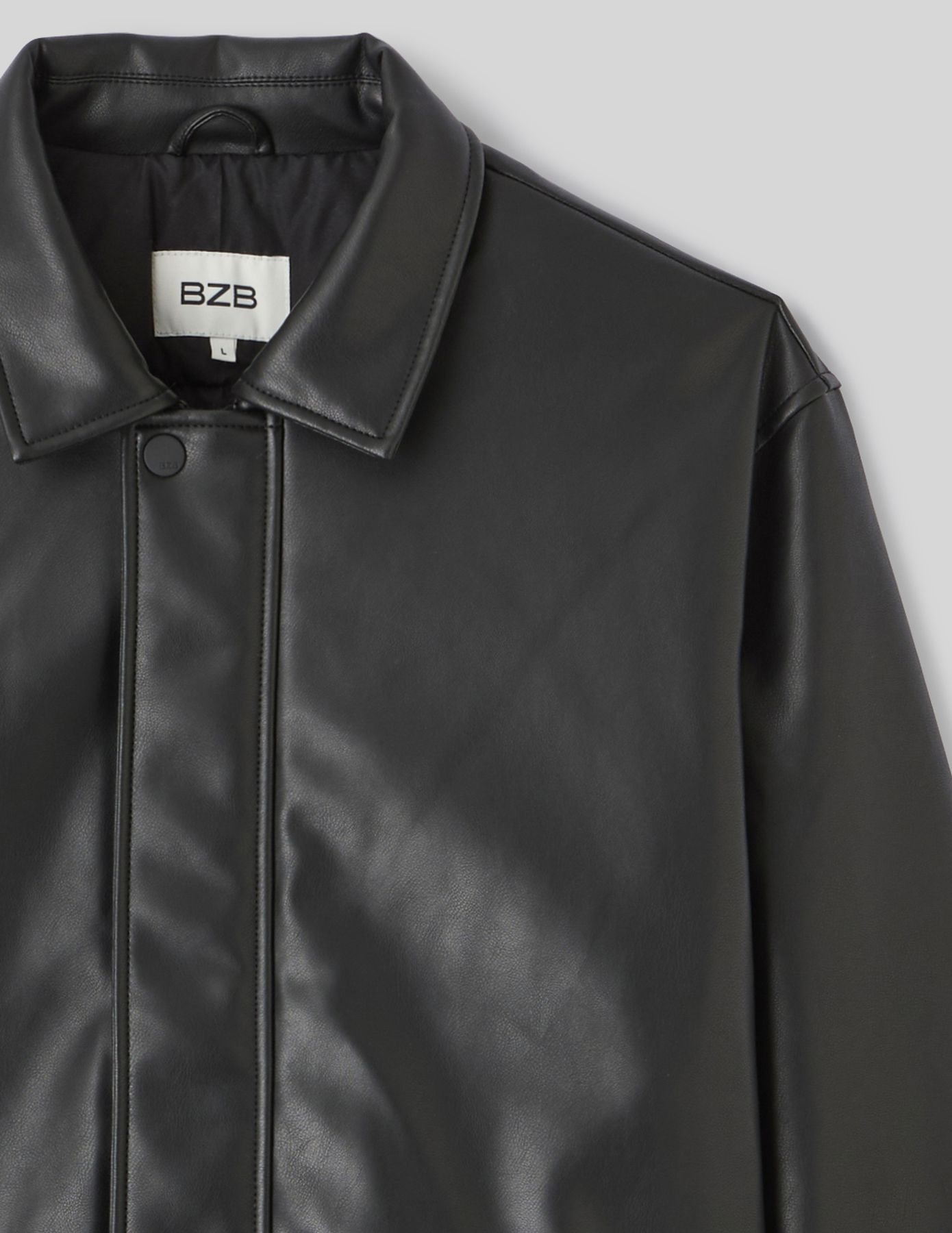 Blouson zippée en tissu enduit