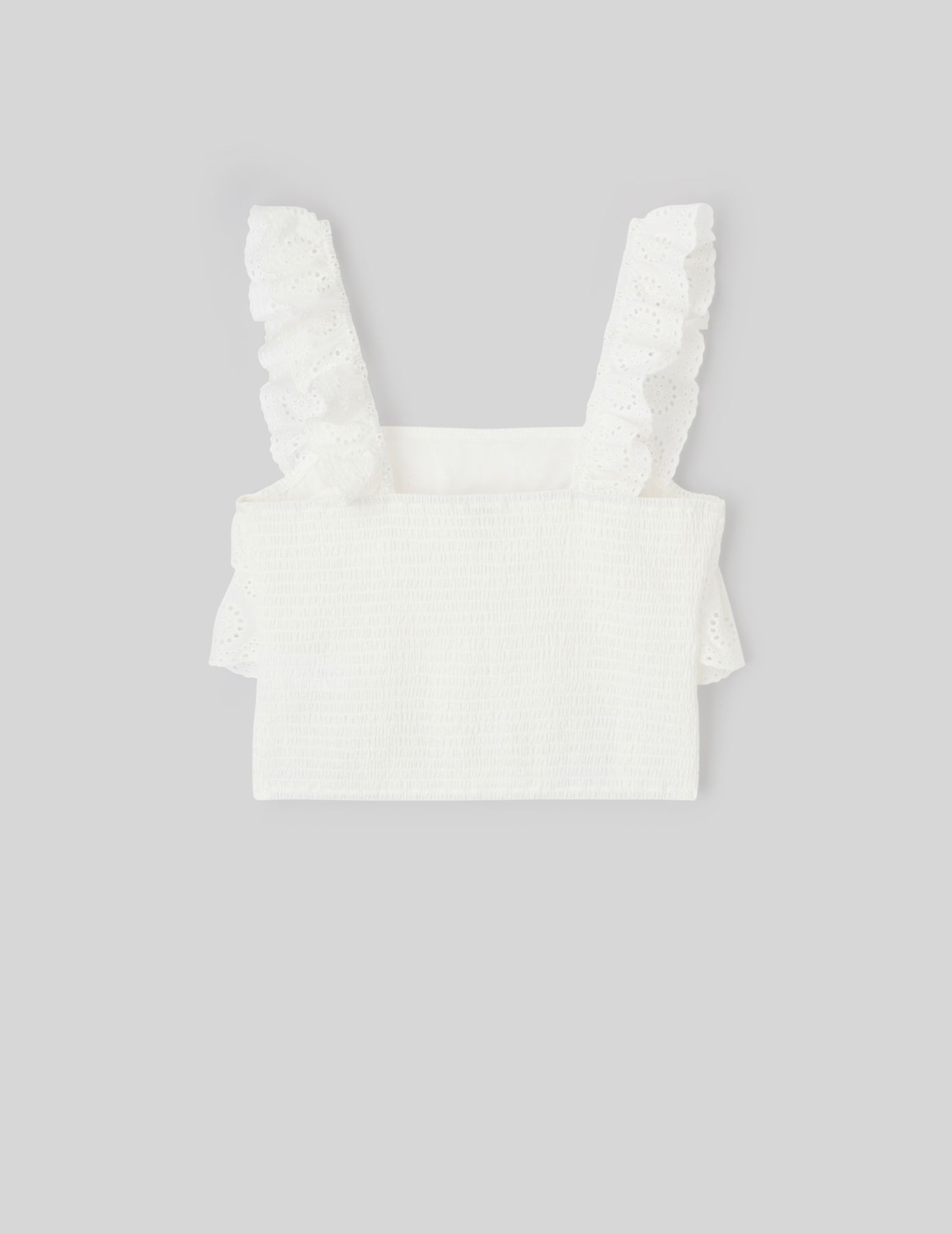 Top broderie anglaise à volant