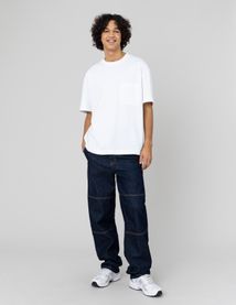 Jean loose &agrave; d&eacute;coupes