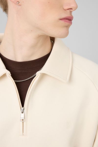 Sweat col polo zipp&eacute;