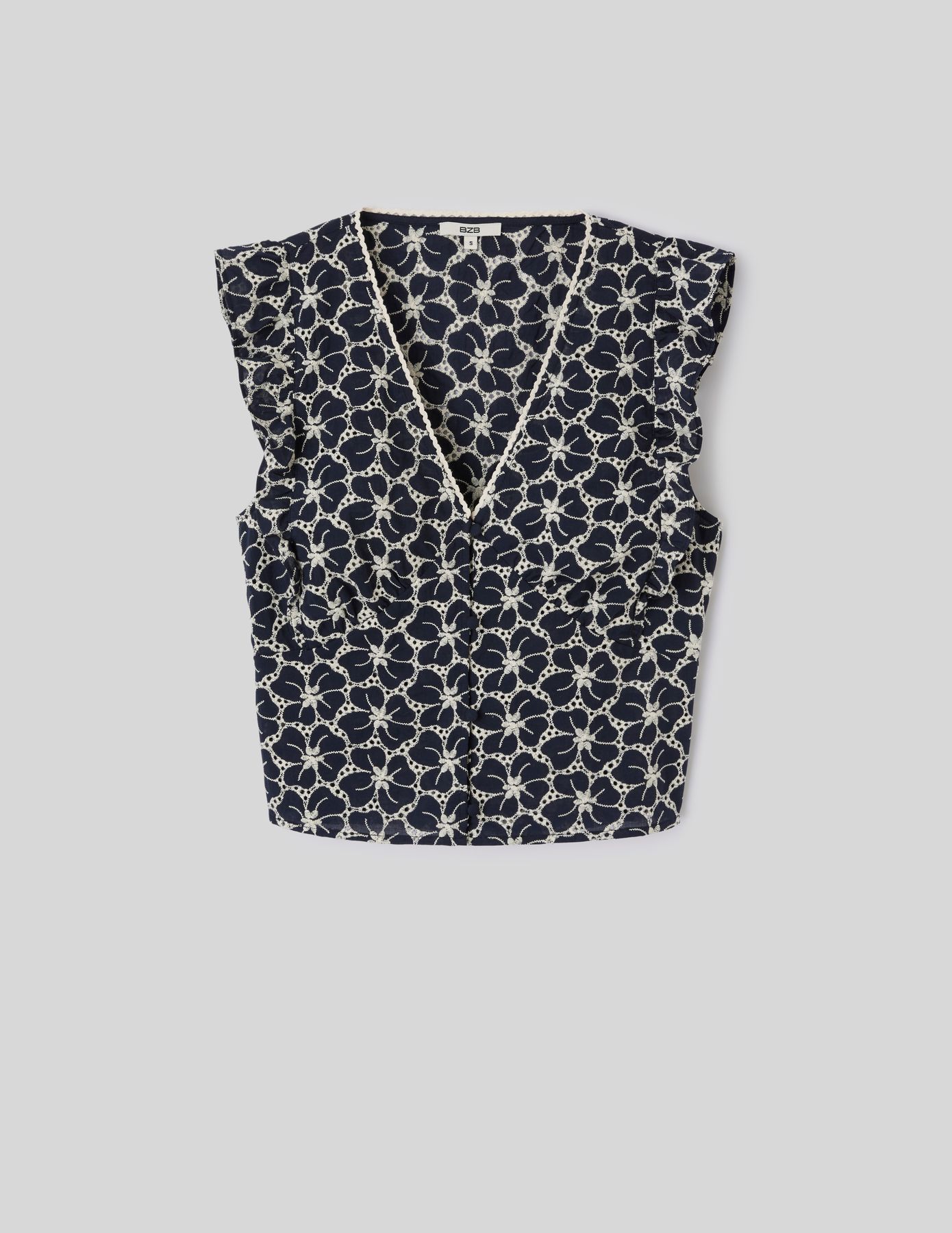 Top &agrave; volants en broderie anglaise