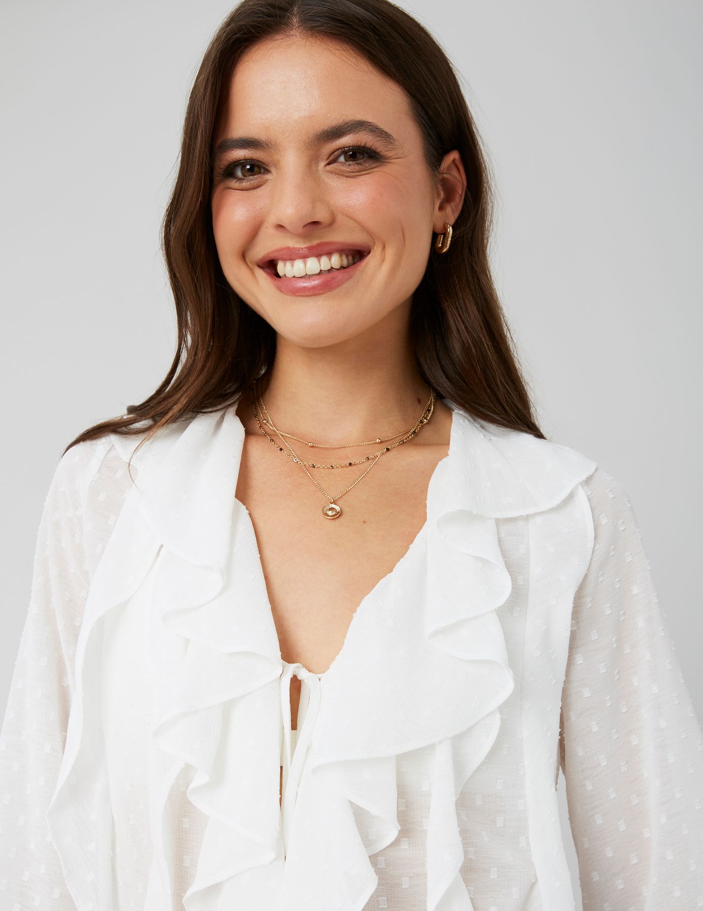 Blouse plumetis à volants