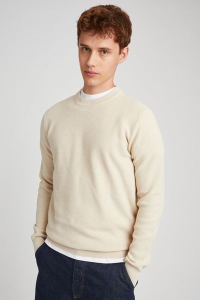 Pull matière fantaisie
