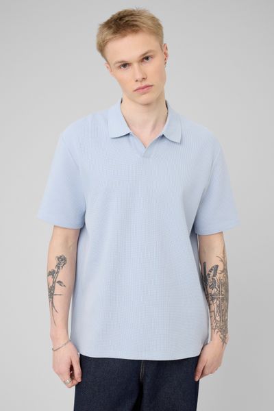 Polo mati&egrave;re gaufr&eacute;e