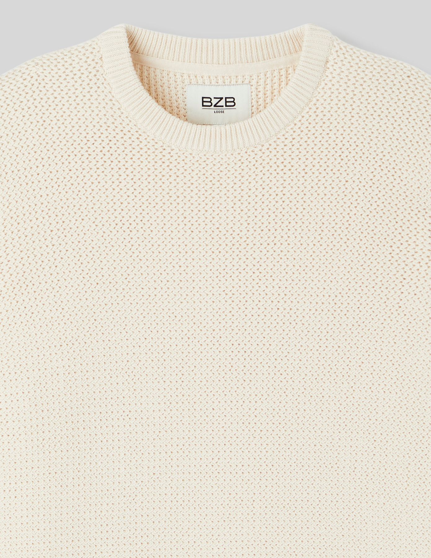 Pull matière fantaisie