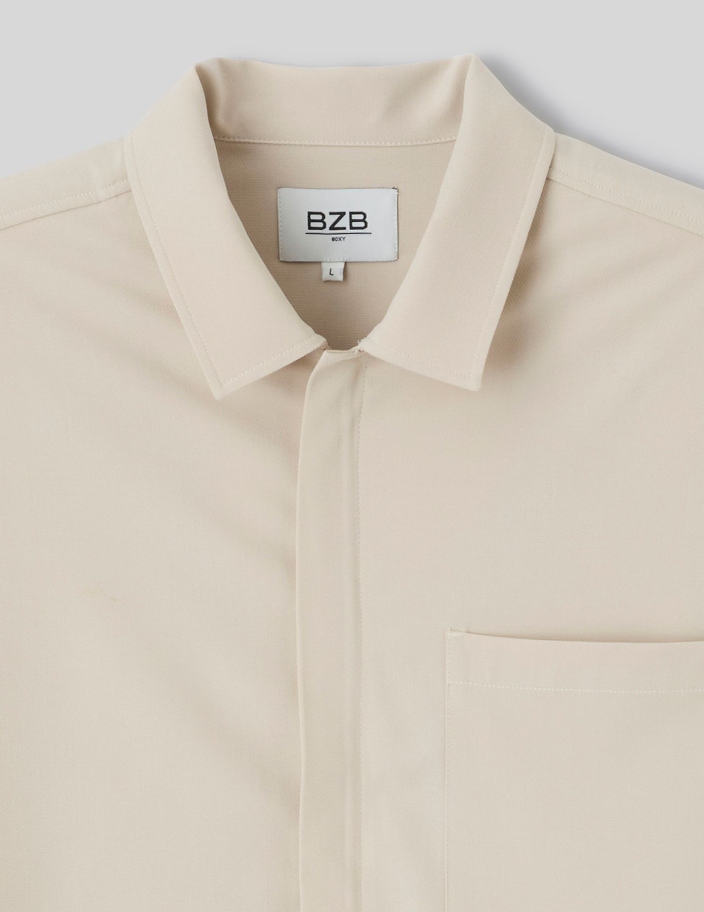 Chemise zipp&eacute;e manches courtes