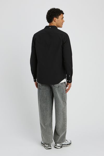 Chemise unie ajust&eacute;e