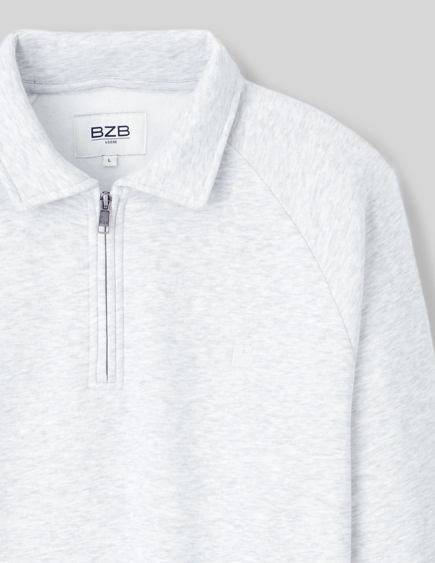 Sweat col polo zippé