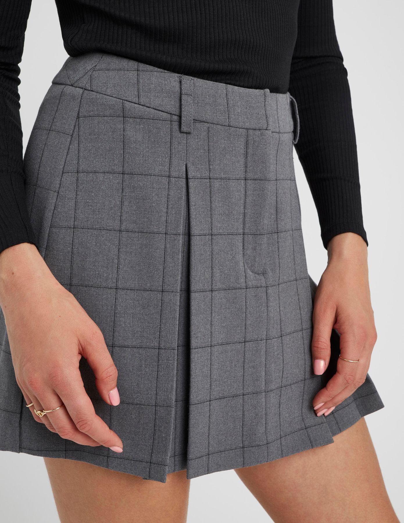 Jupe short plissée à carreaux