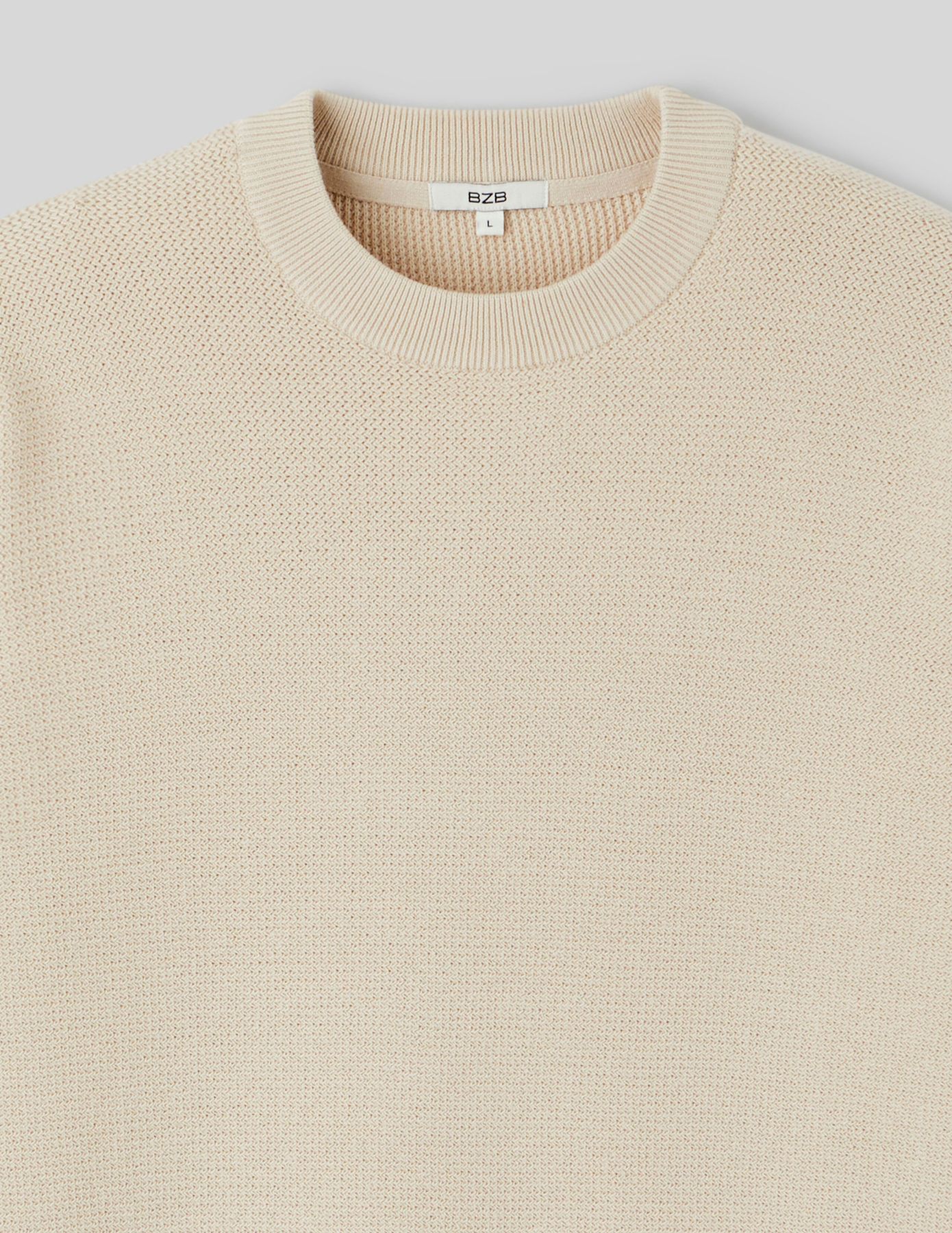 Pull matière fantaisie